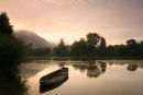 06-7439 A Misty Dawn on the Dordogne River with a Traditional Boat in the Foreground.